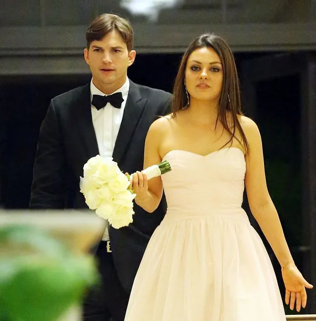 EXCLUSIVE: **STRICTLY NO WEB UNTIL 3PM PST MONDAY 9TH DECEMBER 2013** Mila Kunis and Ashton Kutcher attend Mila's brother Michael Kunis wedding with Alexandra Blacker in St. Petersburg Fl