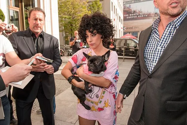 Lady-Gaga-arrives-with-her-Dog-Berlin-Germany