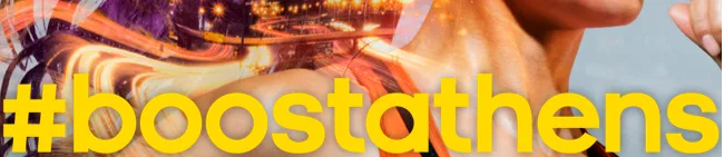 Κίτρινο hashtag #boostathens πάνω σε φόντο με δρομέα και φώτα πόλης.