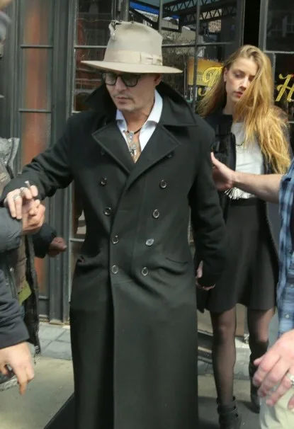 Amber Heard looks tired as she leaves the hotel with Johnny Depp in NYC