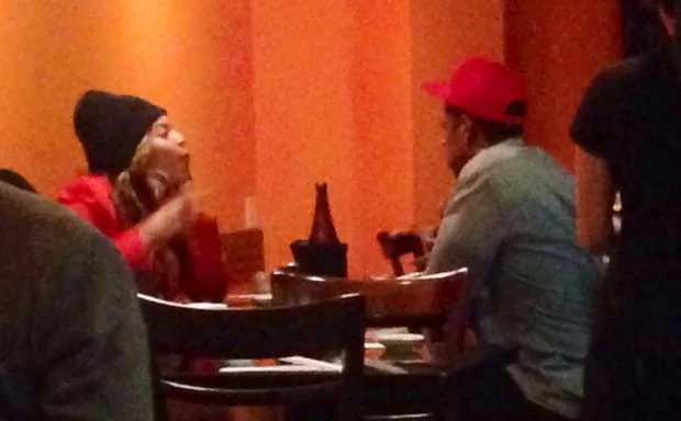 EXCLUSIVE: **PREMIUM EXCLUSIVE RATES** Beyonce looks unhappy as Jay-Z appears to pay more attention to his phone than her while they dine out in LA
