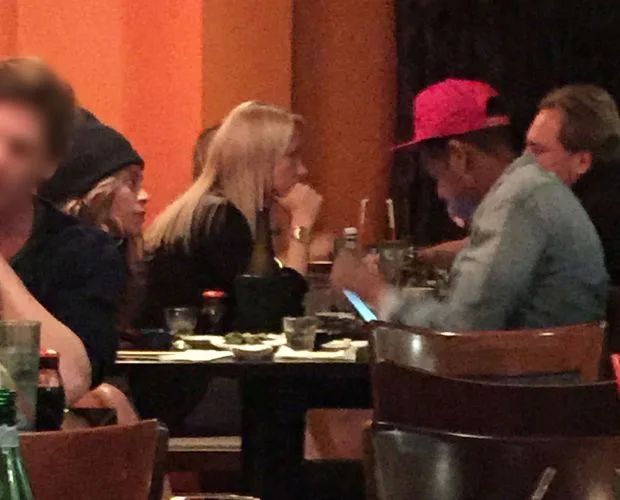 EXCLUSIVE: **PREMIUM EXCLUSIVE RATES** Beyonce looks unhappy as Jay-Z appears to pay more attention to his phone than her while they dine out in LA