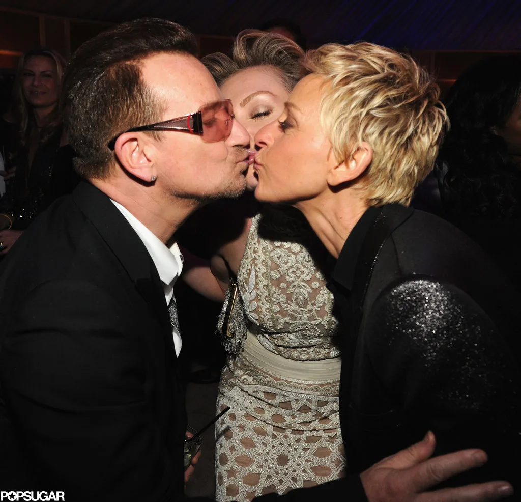 Ellen-DeGeneres-Portia-de-Rossi-went-three-way-kiss