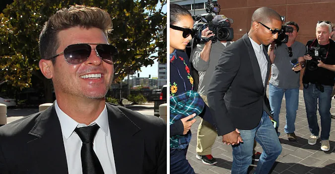 Ο Robin Thicke και ο Pharrell Williams σε εξωτερικό χώρο.