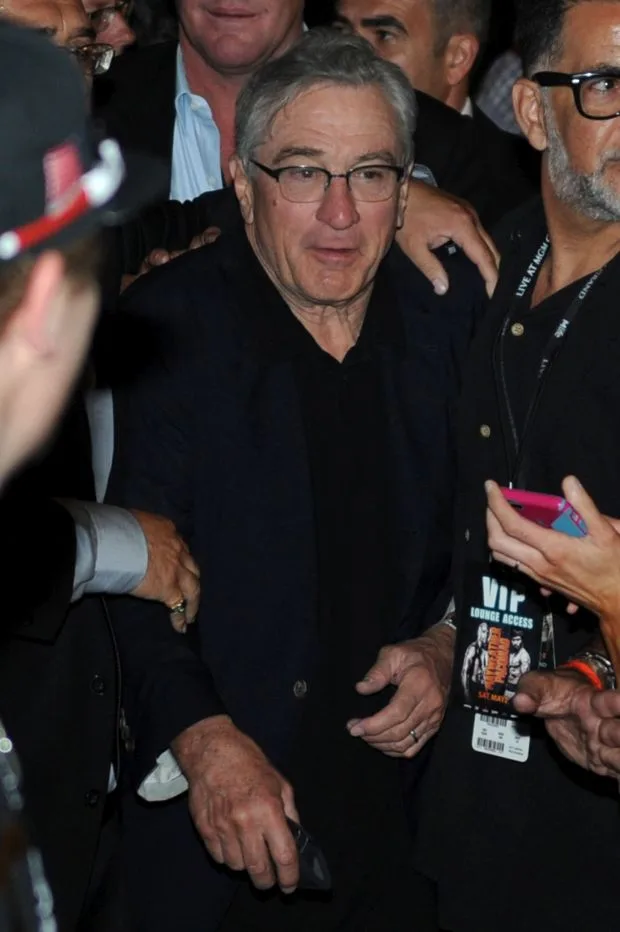Robert De Niro gets mobbed as he leaves the Mayweather fight in Las Vegas!