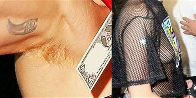 Κοντινό πλάνο της Miley Cyrus με αξύριστη μασχάλη και διχτυωτή μπλούζα.