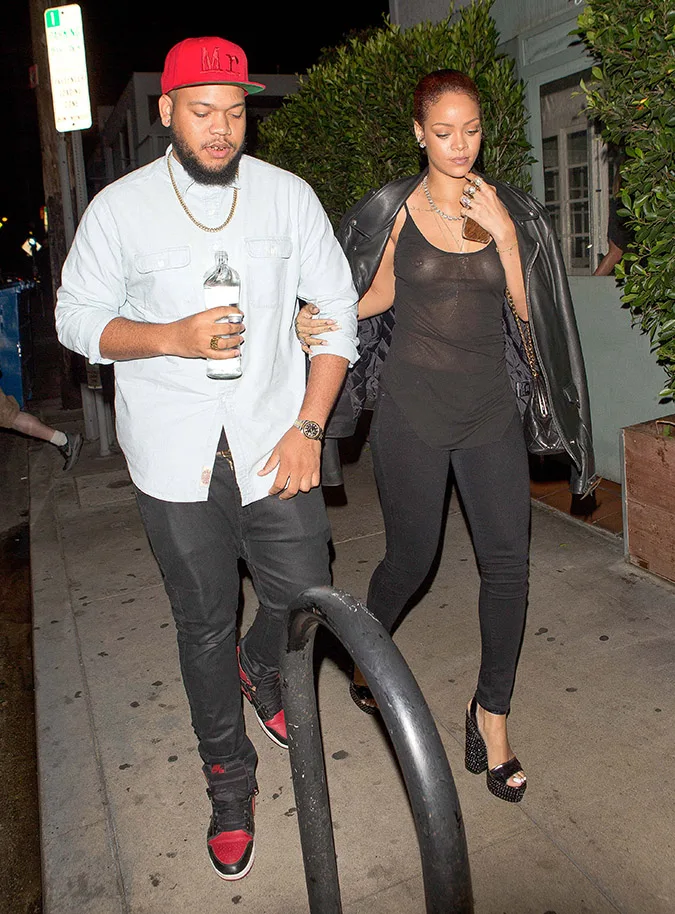 Rihanna wears a sheer black top as she leaves dinner at Giorgio Baldi Restaurant