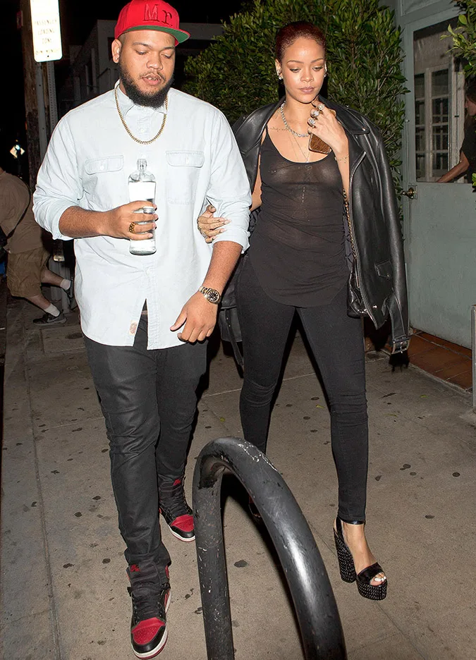 Rihanna wears a sheer black top as she leaves dinner at Giorgio Baldi Restaurant