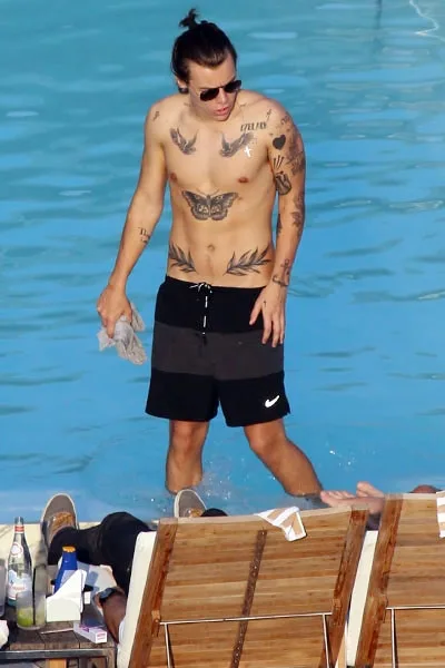harry-styles-one-direction-beach-bodies-billboard-400