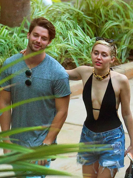 miley-cyrus-patrick-schwartzenegger-miami-2014-billboard-450