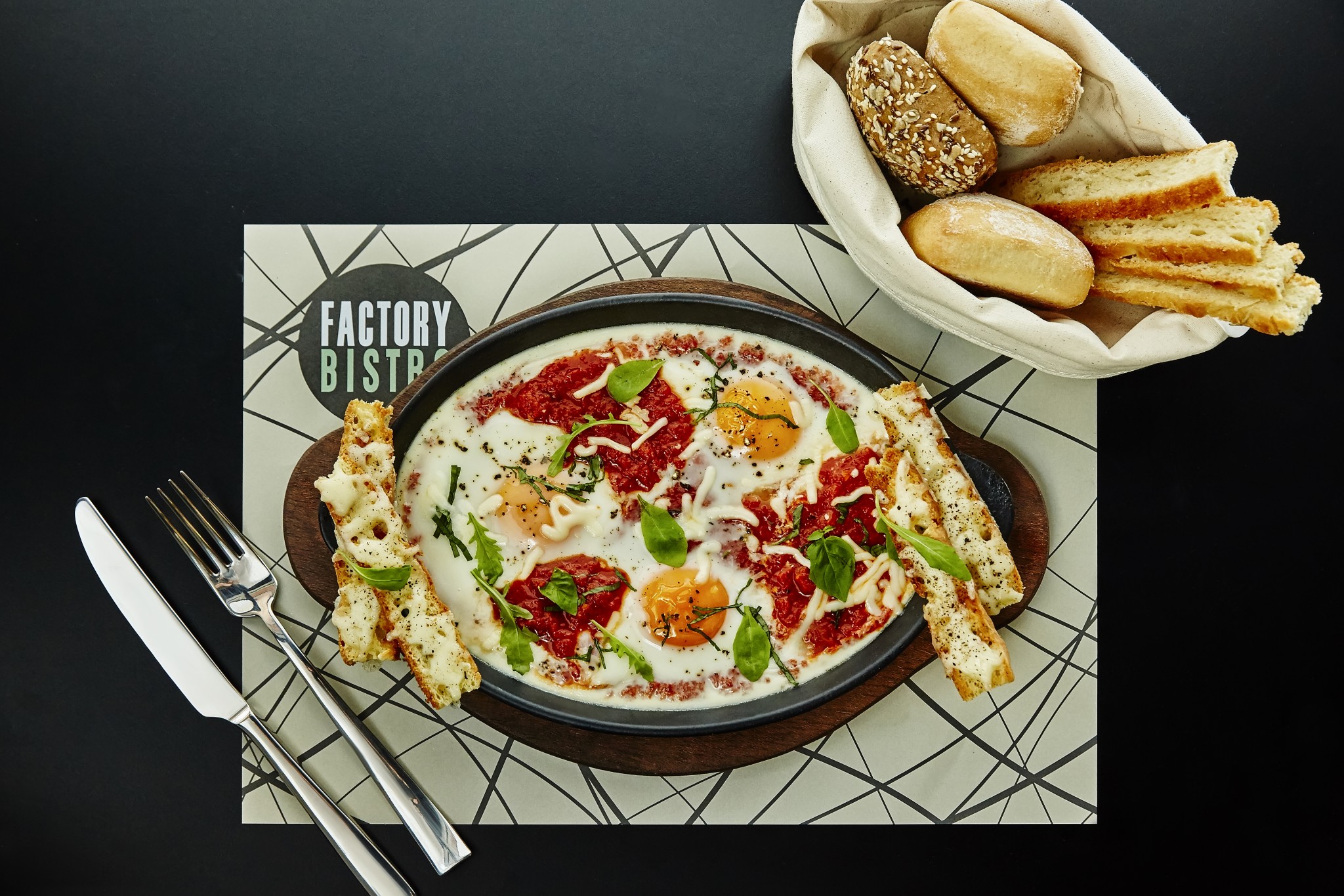 Eggs with fresh tomato sauce and parmezan