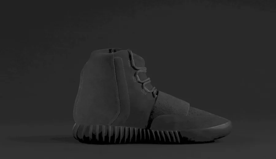 Μαύρο αθλητικό παπούτσι Adidas Originals Yeezy Boost 750 σε σκούρο φόντο.