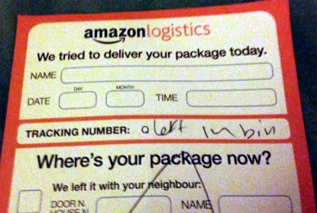 Amazon came under fire yesterday after one of their delivery drivers left two Christmas parcels - in the bin. See SWNS story SWBIN; Customer Phil Norris and his wife returned home to find a note saying something had arrived while they were out (pictured).Above the section 'Where's your package now?' the courier had scrawled 'Left in bin'.