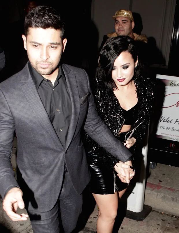 Wilmer Valderrama & Girlfriend Demi Lovato hold hands as they leave a restaurant in Los Angeles.Pictured: Wilmer Valderrama, Demi LovatoRef: SPL1183313 231115 Picture by: BelloSplash News and PicturesLos Ang