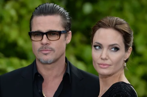 Angelina Jolie attends the premiere of "Maleficent" at Kensington Palace, Kensington, London, UK, on May 8, 2014. Pictured: Angelina Jolie and Brad Pitt Ref: SPL754141  080514   Picture by: James Whatling / Splash News Splash News and Pictures Los Angeles:	310-821-2666 New York:	212-619-2666 London:	870-934-2666 photodesk@splashnews.com 