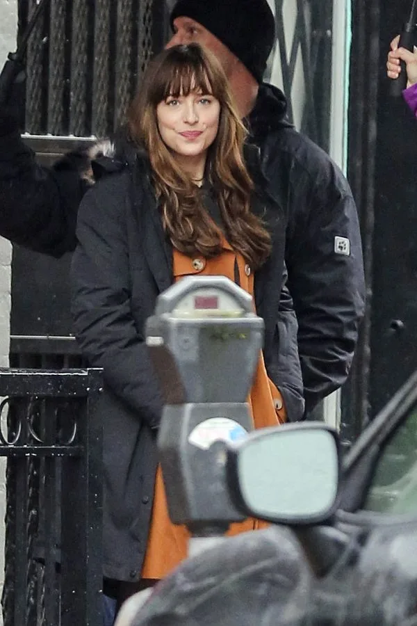 Jamie Dornan and Dakota Johnson are back in Vancouver to begin production on 'Fifty Shades Darker' the sequel to last year's $500M+ hit to 'Fifty Shades of Grey.' Now sporting some bad boy scruff, Jamie Dornan waits for Dakota Johnson outside of 'Seattle