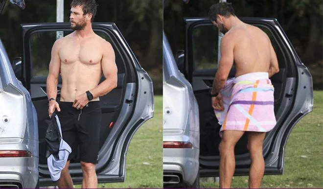 Ο Chris Hemsworth δίπλα σε ένα αυτοκίνητο.