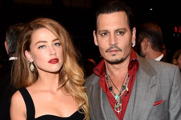 TORONTO, ON - SEPTEMBER 14: Actors Amber Heard (L) and Johnny Depp attend the "Black Mass" premiere during the 2015 Toronto International Film Festival at The Elgin on September 14, 2015 in Toronto, Canada. (Photo by Jason Merritt/Getty Images)
