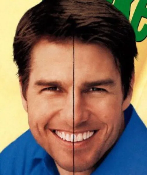 Κοντινό πλάνο του Tom Cruise με μια κάθετη γραμμή στο κέντρο του προσώπου του.