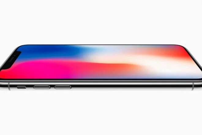 Πλαϊνή όψη του iPhone X με αναμμένη την οθόνη.