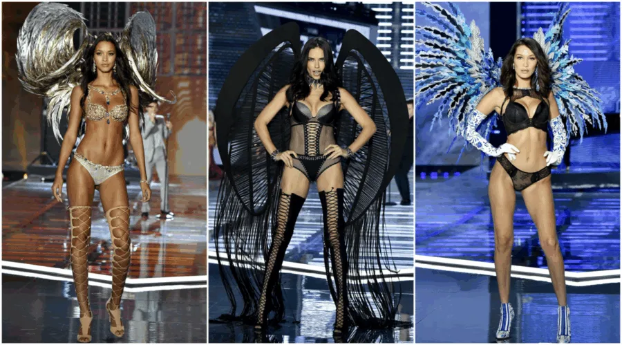 Τρία μοντέλα της Victoria’s Secret στην πασαρέλα με φτερά αγγέλων.