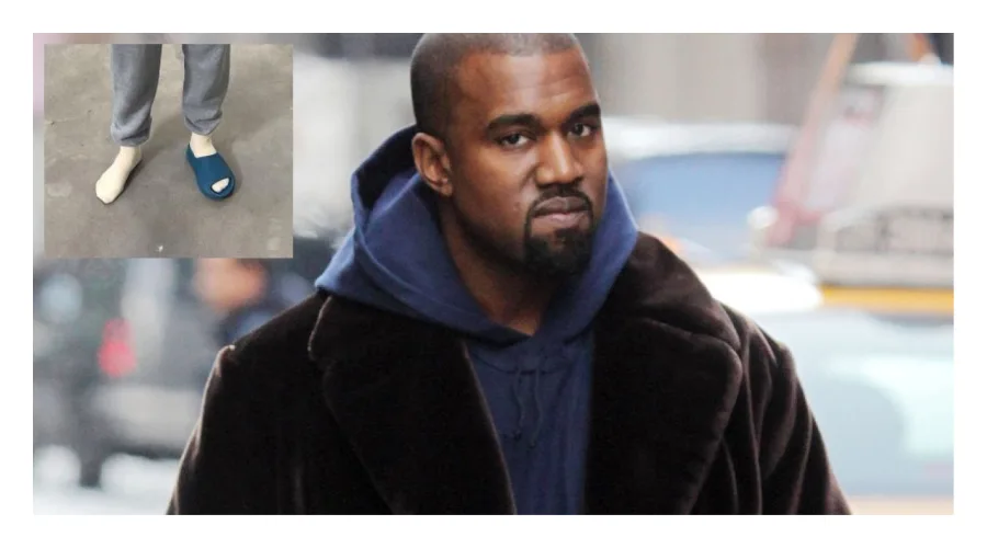 Ο Kanye West με μπλε φούτερ και καφέ παλτό δίπλα σε φωτογραφία με τα νέα του παπούτσια.