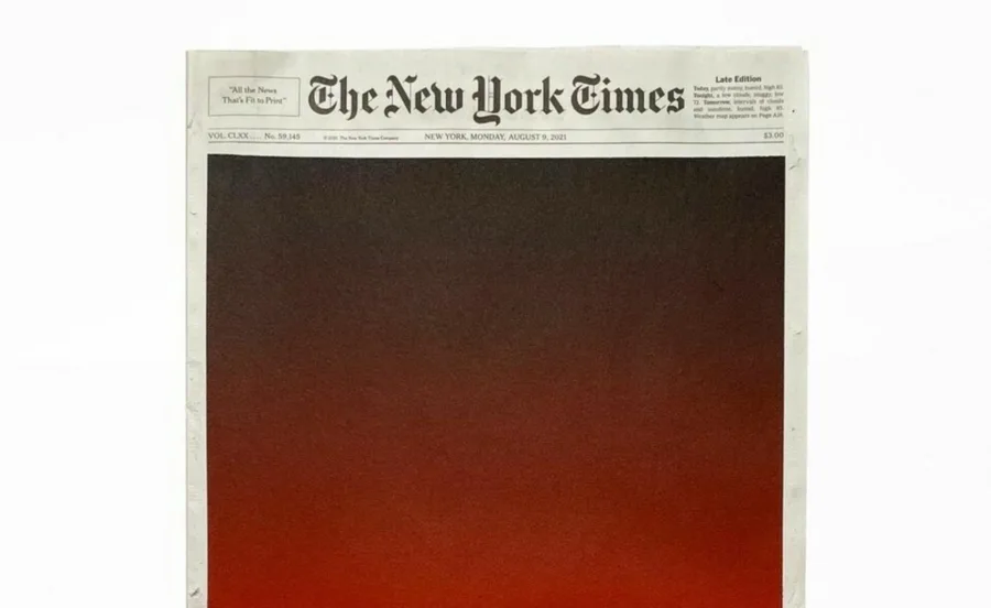 Πρωτοσέλιδο των New York Times με ένα βαθύ κόκκινο και μαύρο ντεγκραντέ χρώμα.