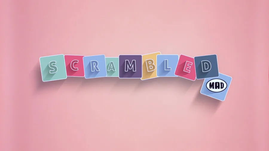 Λογότυπο της εκπομπής SCRAMBLED του MAD TV σε ροζ φόντο.