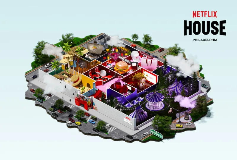 Το λογότυπο του Netflix σε φόντο που παραπέμπει στα νέα θεματικά πάρκα Netflix Houses.