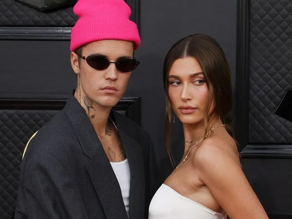 Justin Bieber (L) and Hailey Bieber (R)