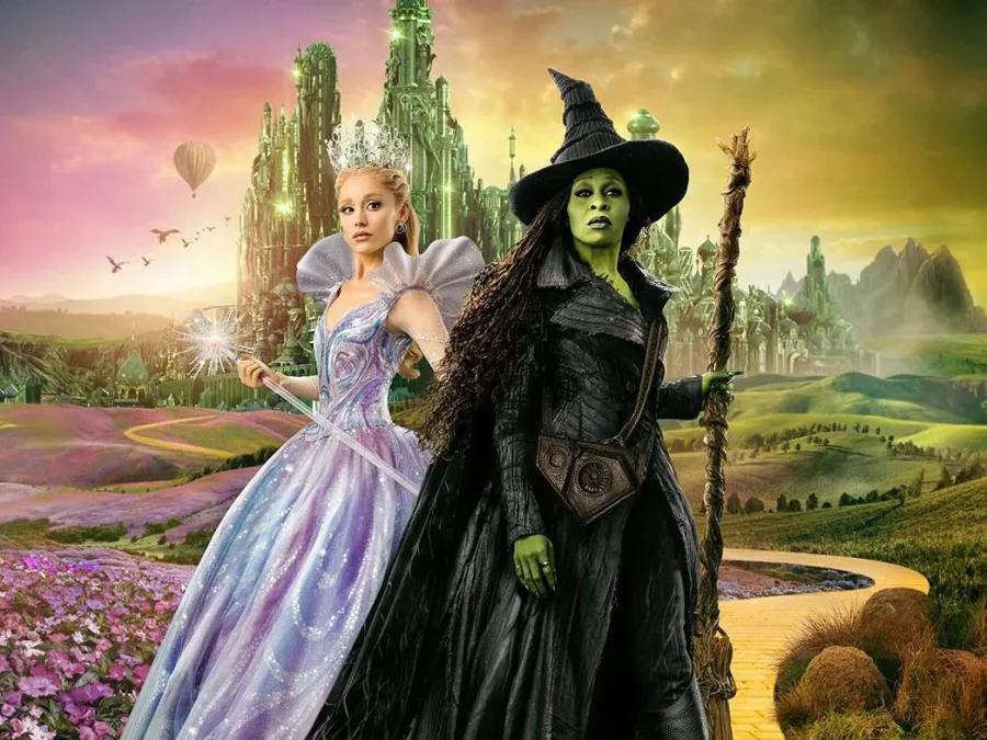 Προωθητική εικόνα από την ταινία Wicked με τις δύο πρωταγωνίστριες σε φανταστικό τοπίο.