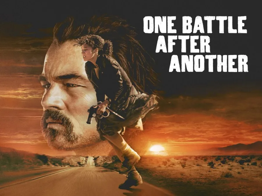 Αφίσα της ταινίας One Battle After Another με τον Leonardo DiCaprio και μια γυναίκα σε έρημο.