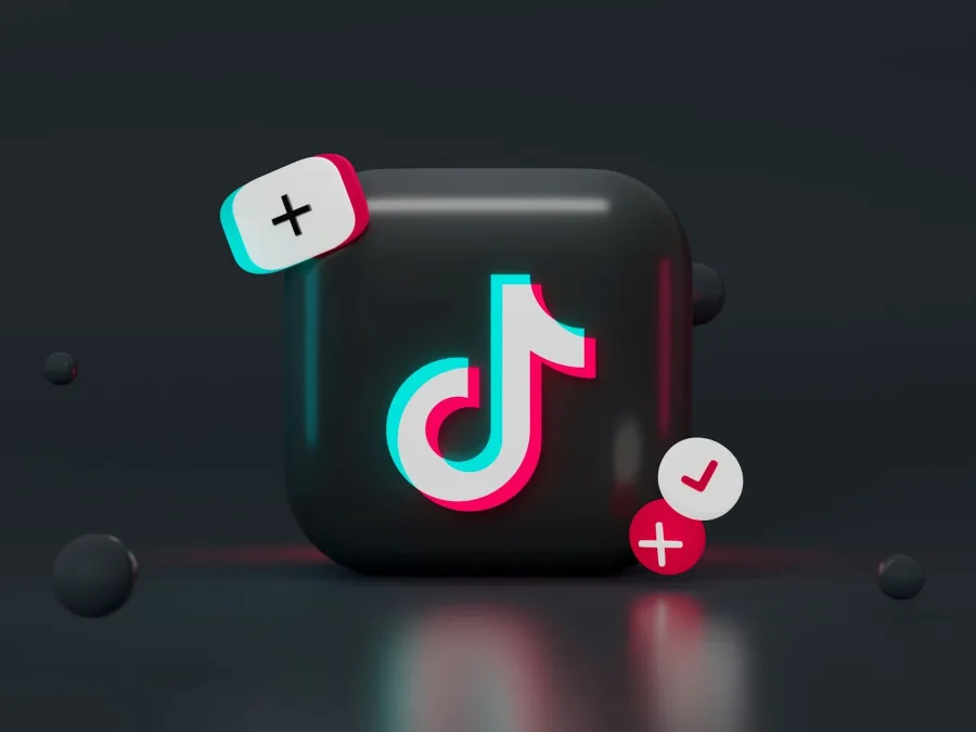 Το λογότυπο του TikTok με εφέ glitch και εικονίδια προσθήκης και επιβεβαίωσης, σχετικό με το viral link-up.