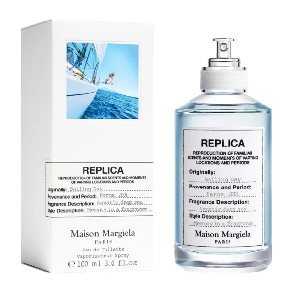 Το άρωμα Sailing Day της σειράς Replica από Maison Margiela δίπλα στη συσκευασία του.