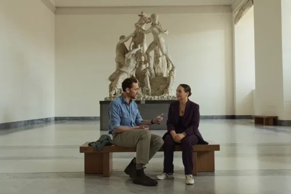 Tom Hiddleston and Dr. Sarita Robinson discuss the history of Pompeii from inside the National Archaeological Museum of Naples. (National Geographic/Paolo Verzone)