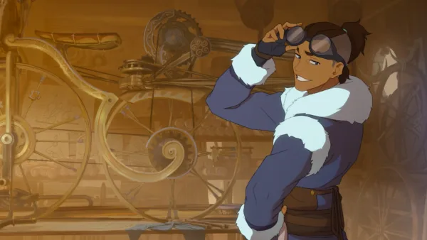 Ο Aang από το Avatar ποζάρει μπροστά από ένα περίτεχνο ποδήλατο, ενώ ετοιμάζεται να δει το νέο trailer.